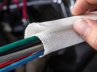 F6  white woven wrap sleeving in  use