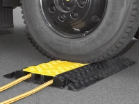 Rubber protector being driven over by a truck