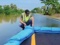 Sandless sandbag being deployed