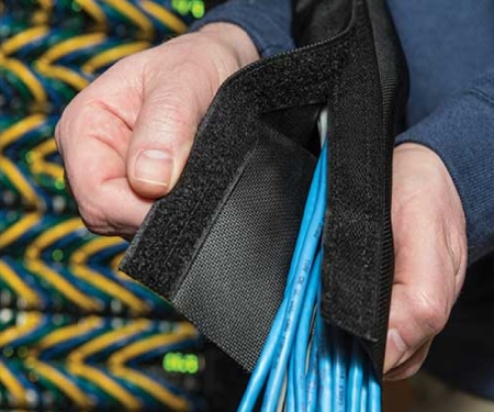 Dura-wrap sleeving being installed Dura-wrap sleeving being installed