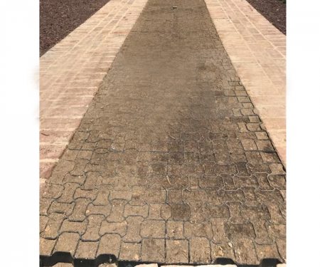 Geogrid permeable paving tile in use with gravel and soil for walk way