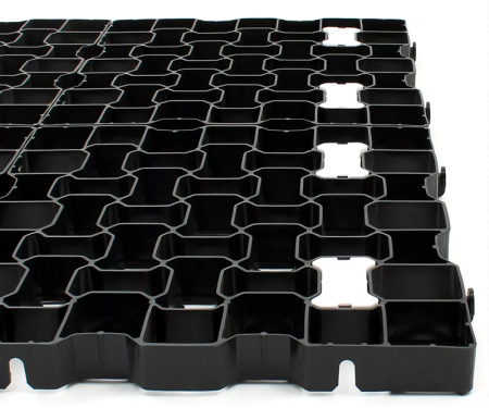 Geogrid permeable paving tile closeup of tile  Geogrid permeable paving tile closeup of tile
