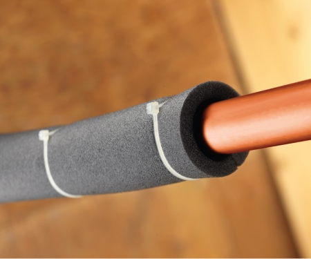 Kynar tie used to fasten protection over pipe