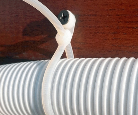 Natural mounted head tie used for securing wire loom Natural mounted head tie used for securing wire loom