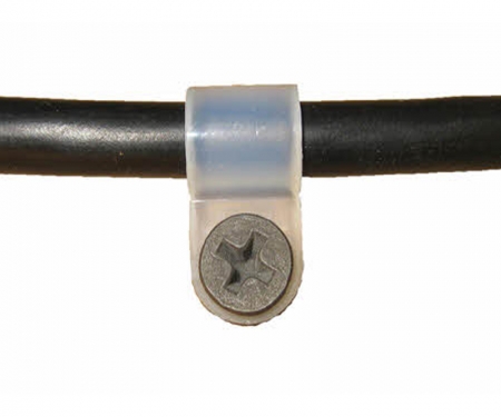 Picture of a natural cable clamp in use securing a wire Picture of a natural cable clamp in use securing a wire