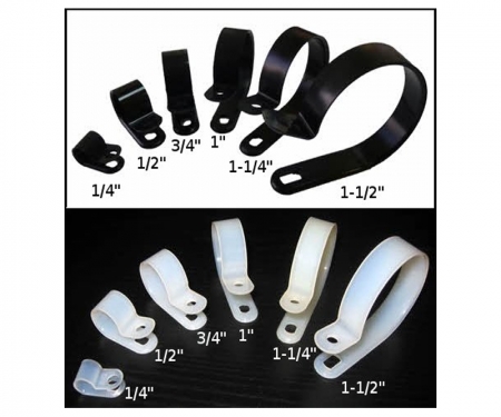 Various sizes of black and natural nylon cable clamps Various sizes of black and natural nylon cable clamps