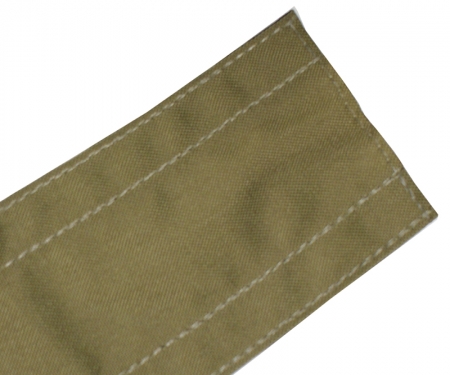 Taupe on carpet fabric cord protector Taupe on carpet fabric cord protector