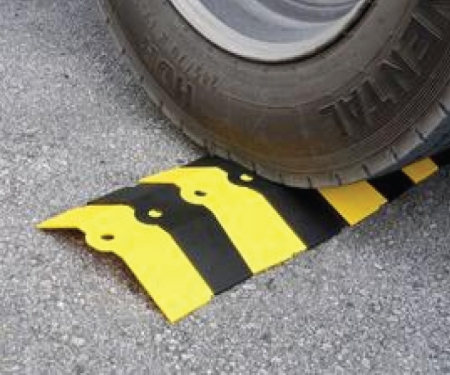 Large Sidewinder cord cover being vehicle-driven over over