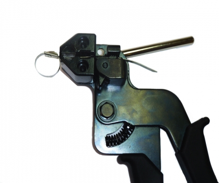 Tie gun with stainless steel zip, cable tie inserted for use Tie gun with stainless steel zip, cable tie inserted for use