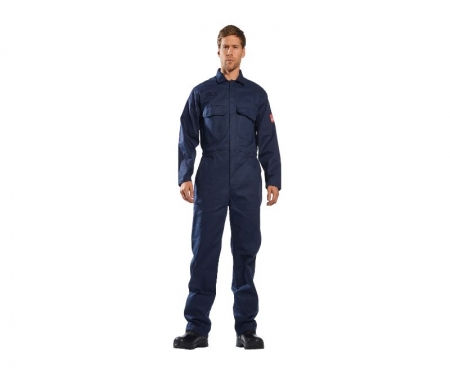 Worker wearing flame resistant suit
