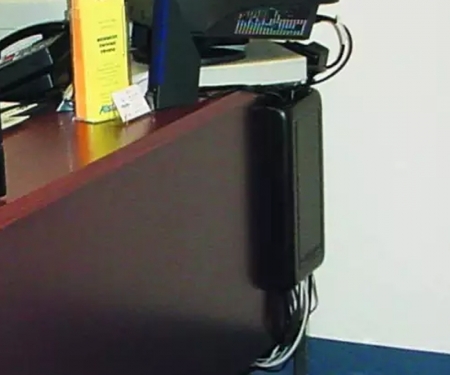 Black wiremate cable manager in use