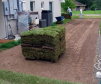 Geogrid permeable paving tile in use with gravel and soil for backyard grass planting