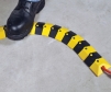Bendable Sidewinder cord cover in use